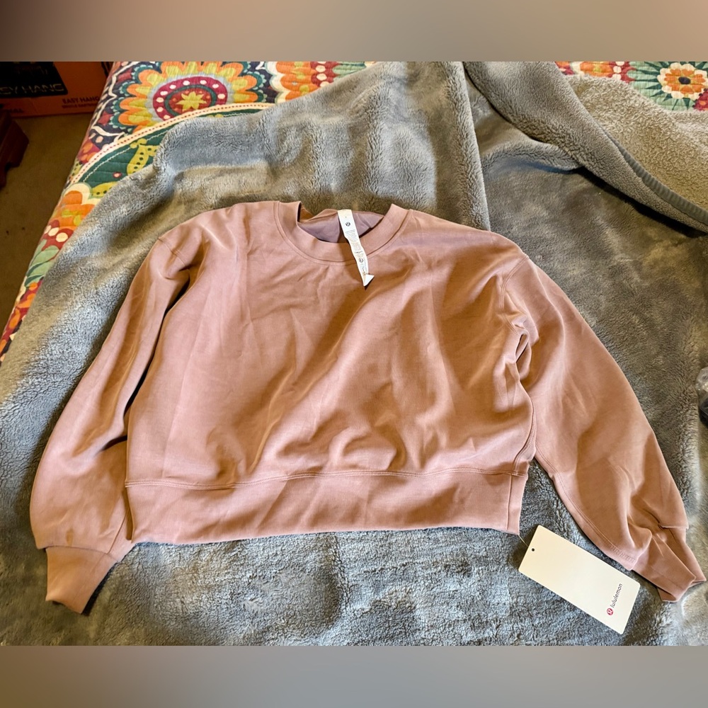 Super cute cropped sweater in twilight rose color. NWT these were gifts.